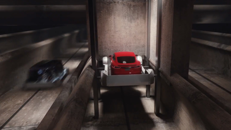 [ВИДЕО] Как работает подземный лифт и метро для автомобилей по версии Tesla